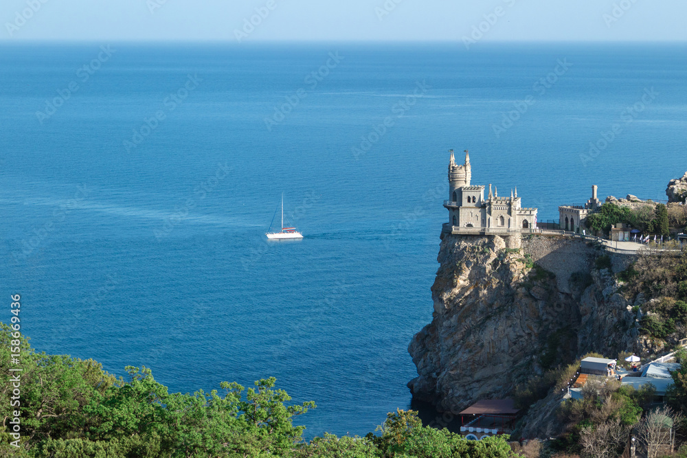 Historical monument of the Crimea. Castle swallow nest against the blue sea