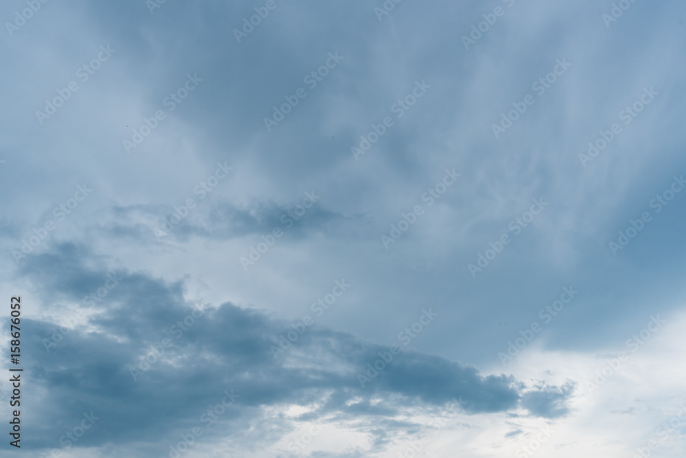 clouds with background,sunlight through very dark clouds background of dark storm clouds,black sky Background of dark clouds before a thunder.