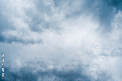 clouds with background,sunlight through very dark clouds background of dark storm clouds,black sky Background of dark clouds before a thunder.