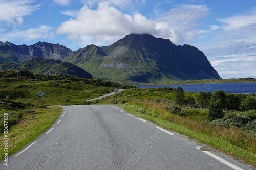 Driving on a road in the fjords in the Lofoten Islands, Norway