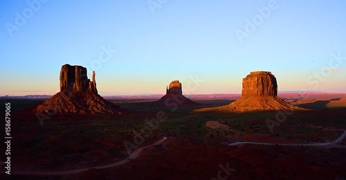 The setting sun rays over Monument Valley, on the border of Utah and Arizona