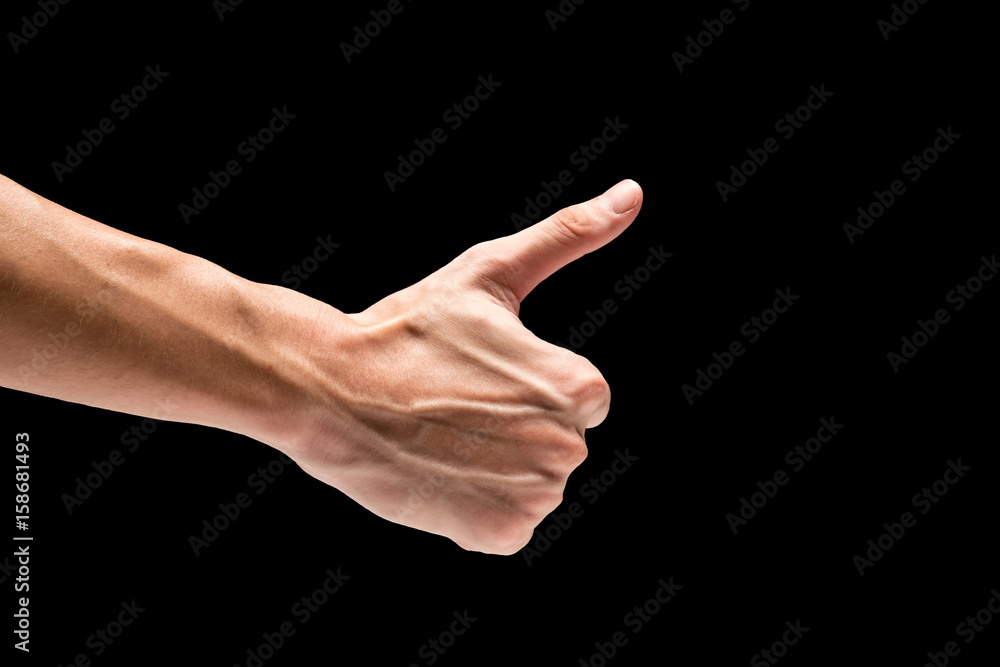 Male hand on a black background. Male hand on a black background.