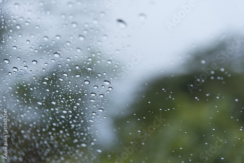 Water drops of rain on car windshield