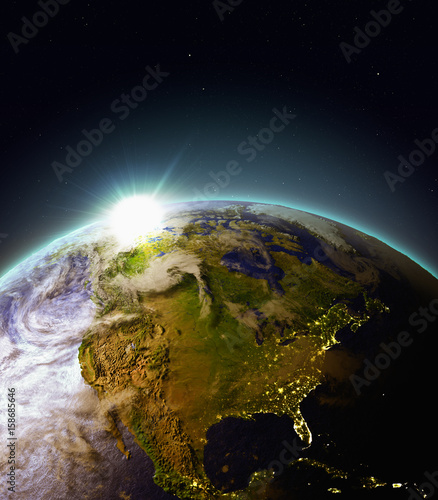 Fototapeta Naklejka Na Ścianę i Meble -  Sunrise above North America from space