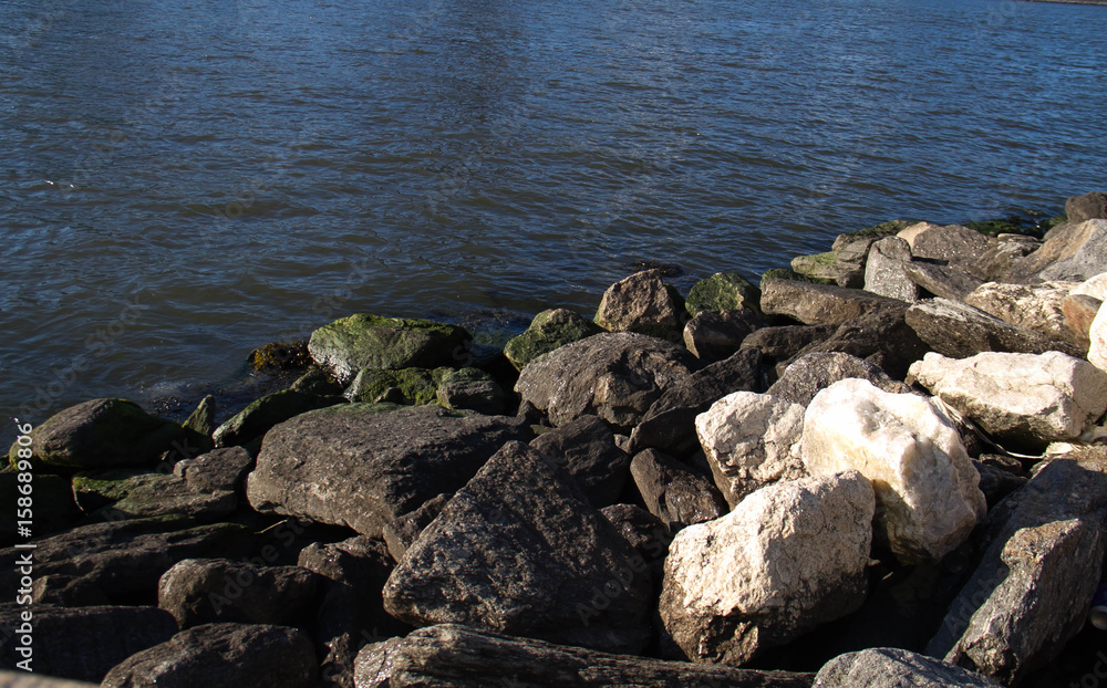 Rocks and blue river Rocks and blue river