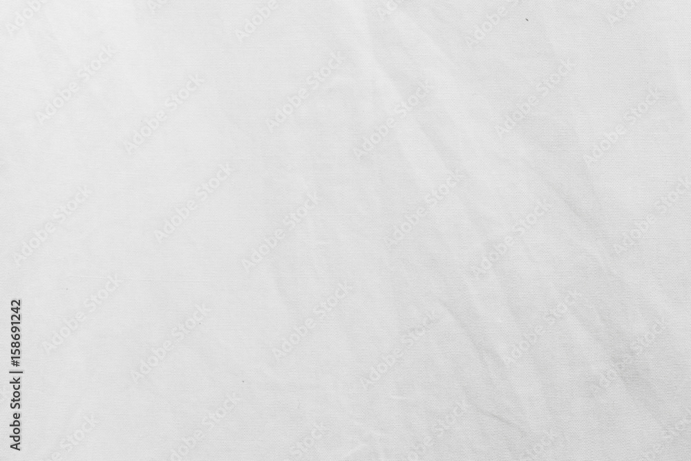 White fabric cloth texture with creased background.