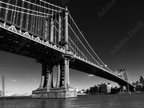 Manhattan bridge over East river in black and white