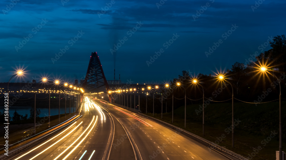 Night road in the city with car lights in Novosibirsk, Russia

