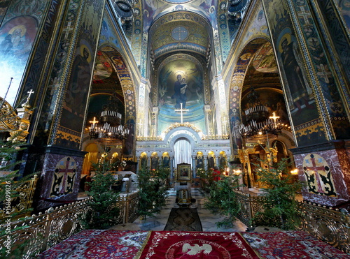 View of the Vladimir Cathedral in Kiev inside. The rich decoration of the Orthodox church photo