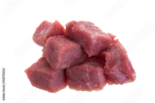 fresh raw beef cubes isolated on white background