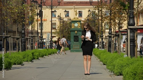 Wallpaper Mural Businessman with tablet on the street. Caucasian woman in formal suit Torontodigital.ca