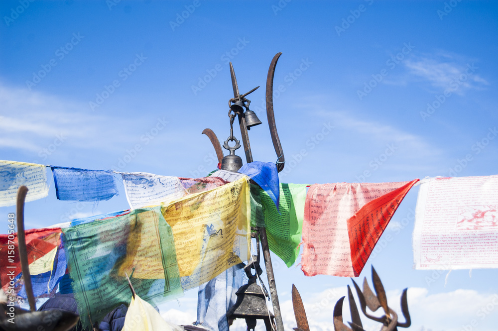 Wallpaper Macro tibetan prayer flags yellow blue red green white mountain  path religion bells Stock Photo | Adobe Stock
