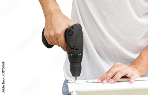 Wallpaper Mural Furniture Assembling Using Battery Drill. Torontodigital.ca