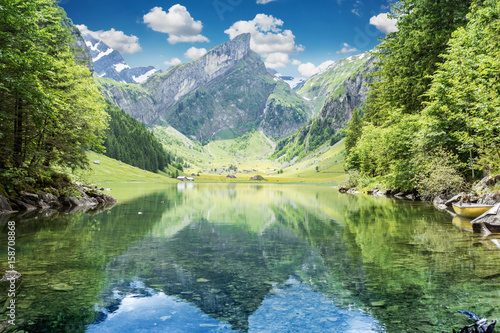 Tranquil scene of seealpsee lake reflecting the mountain of Alpstein, Appenzell, Switzerland