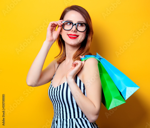 Woman with colour shopping bags