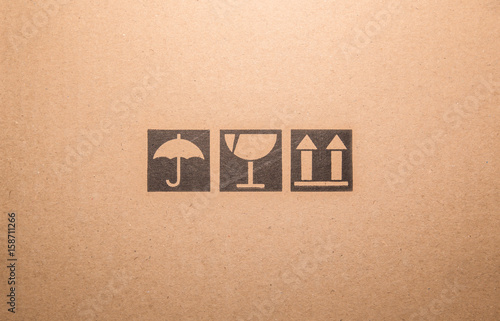 Symbol  box Paper texture brown sheet background.