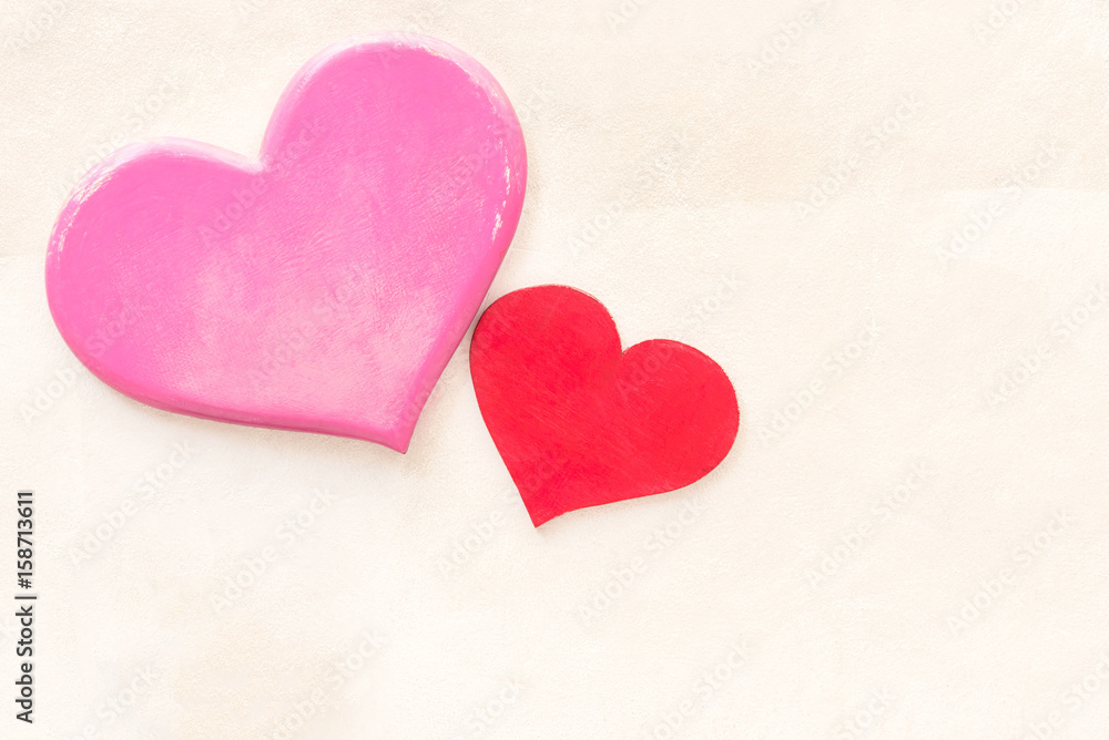 Valentines Day background with decorative pink wooden heart on concrete stone with copy space for text.Valentine's Day concept. View from above.