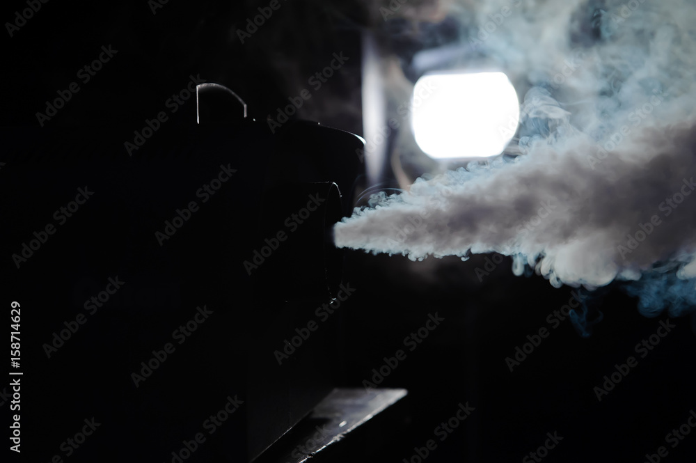 lights in smoke, studio lights shining through the smoke from smoke machine.  Stock Photo | Adobe Stock