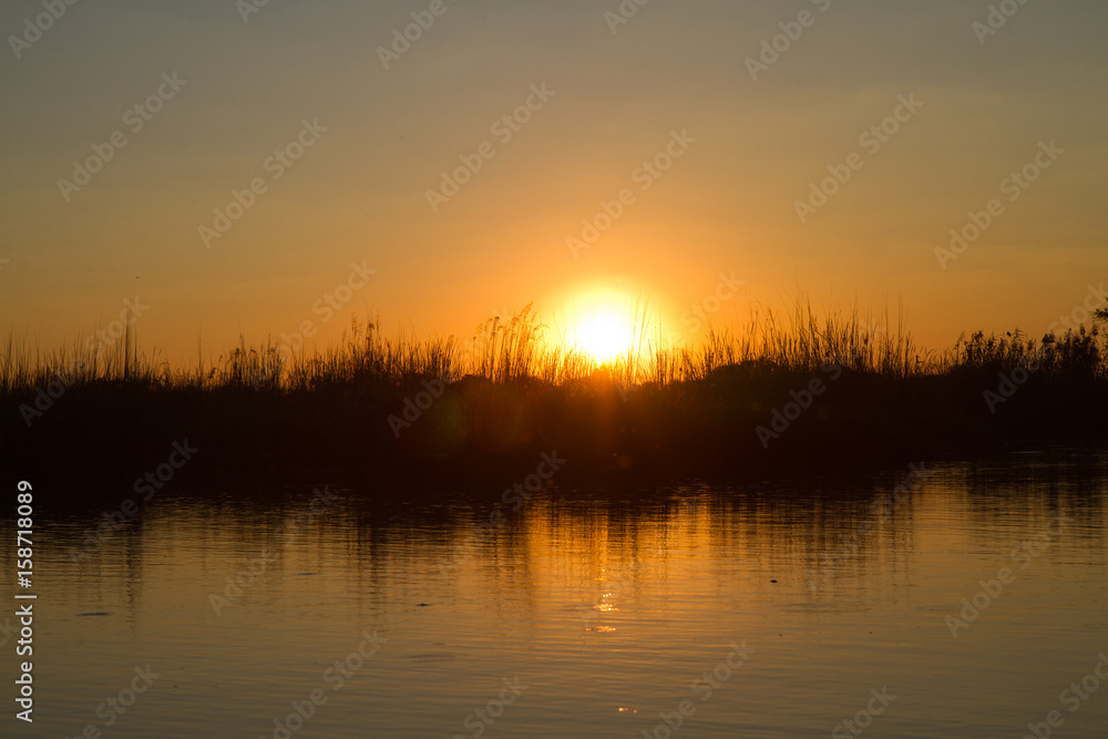 delta of the okavango sunset delta of the okavango sunset