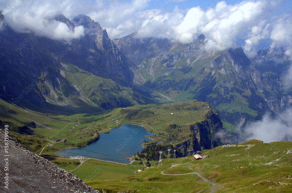 Naklejka premium The picturesque valley of Uri Alps with Lake Truebsee and Mount Titlis, Switzerland
