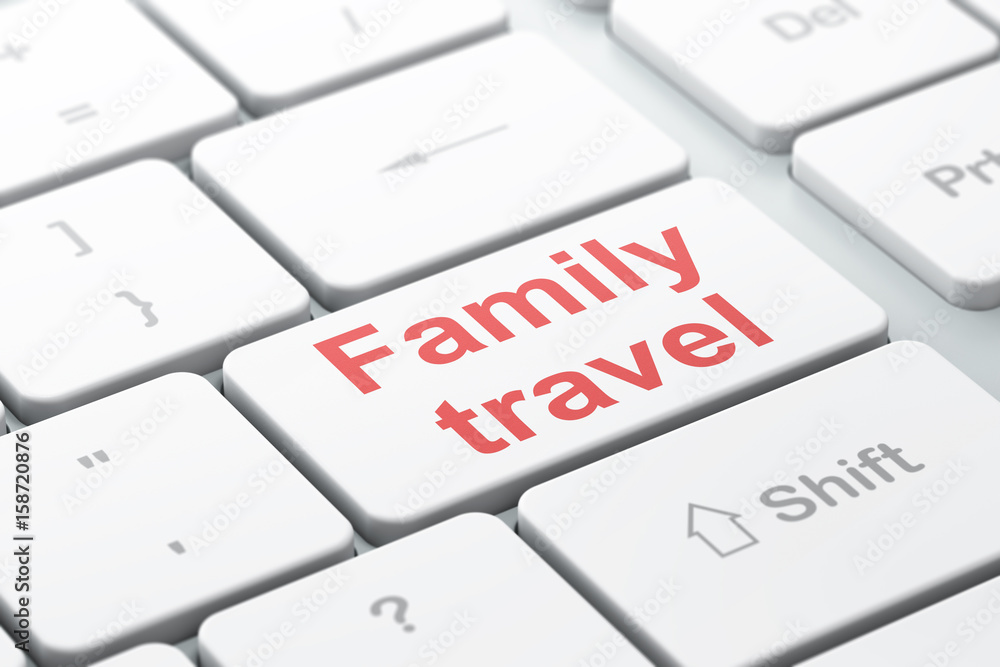 Travel concept: Family Travel on computer keyboard background Travel concept: Family Travel on computer keyboard background