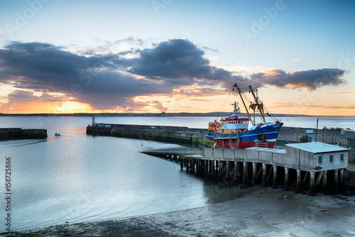Sunrise over Newlyn Harbour photo
