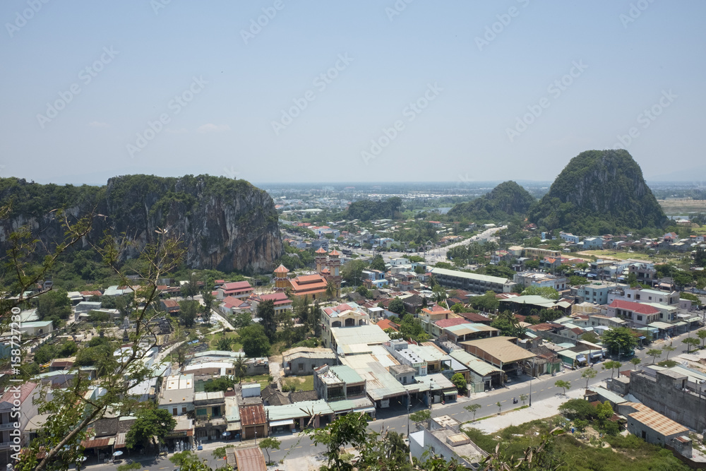 HOI AN, VIETNAM. View of Marble hills in Ngu Hanh Son district, Vietnam. Marble mountains is a cluster of five marble and limestone hills