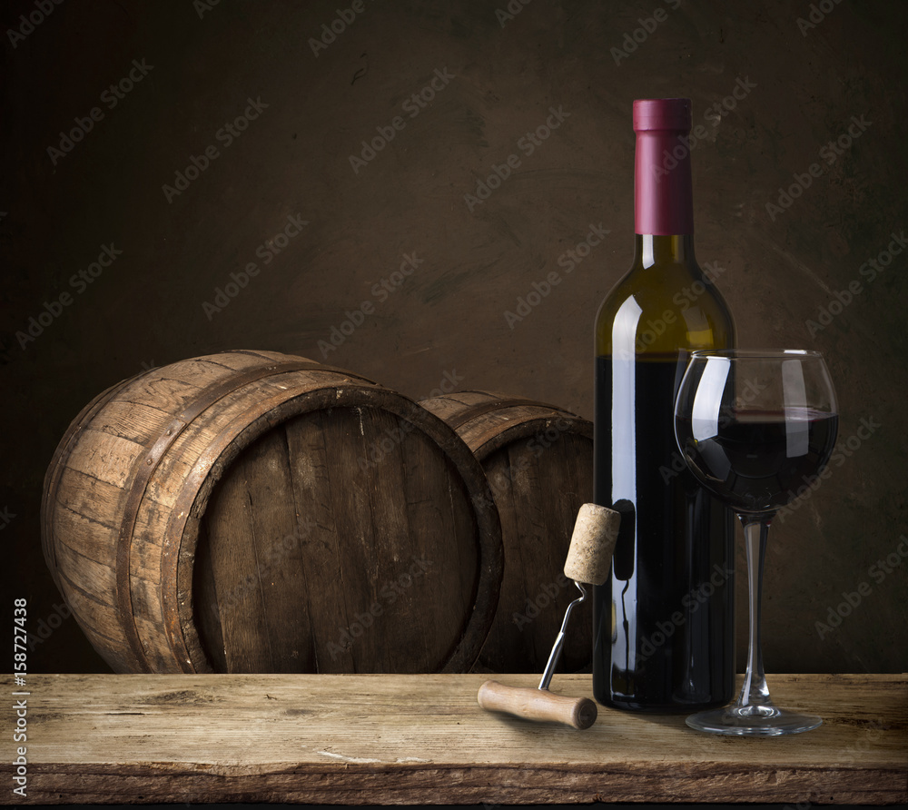 red wine bottle and wine glass on wodden barrel Stock Photo Adobe Stock