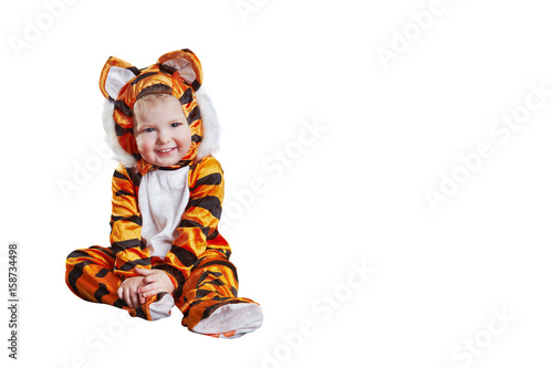 Adorable baby in tiger costume playing smiling acting isolated on white with blank space