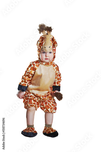Small cute kid in amazing giraffe costume isolated on white