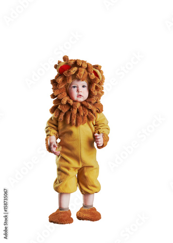 Adorable kid in lion costume on white background isolated