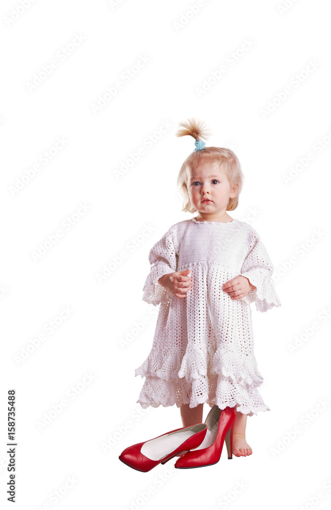 Small girl with high hilt red shoes shopping problems concept Small girl with high hilt red shoes shopping problems concept