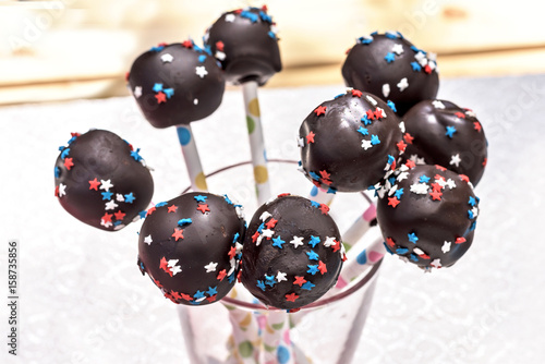 Homemade chocolates on a stick. Summer delicious desserts