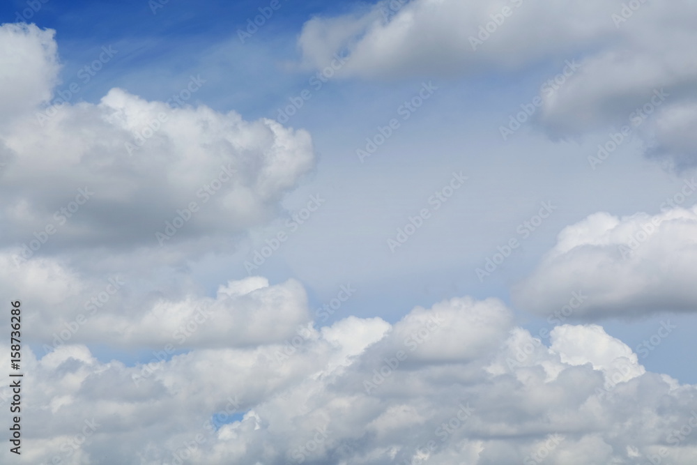 Blue sky with big shape cumulus cloud in the afternoon. Soft focus. Background concept with copy space. Blue sky with big shape cumulus cloud in the afternoon. Soft focus. Background concept with copy space.