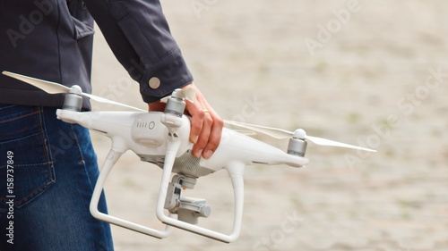 drone in the hand of the operator before the flight