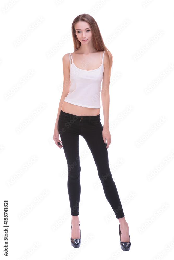 Fototapeta premium Very thin Young woman staying on white bacground