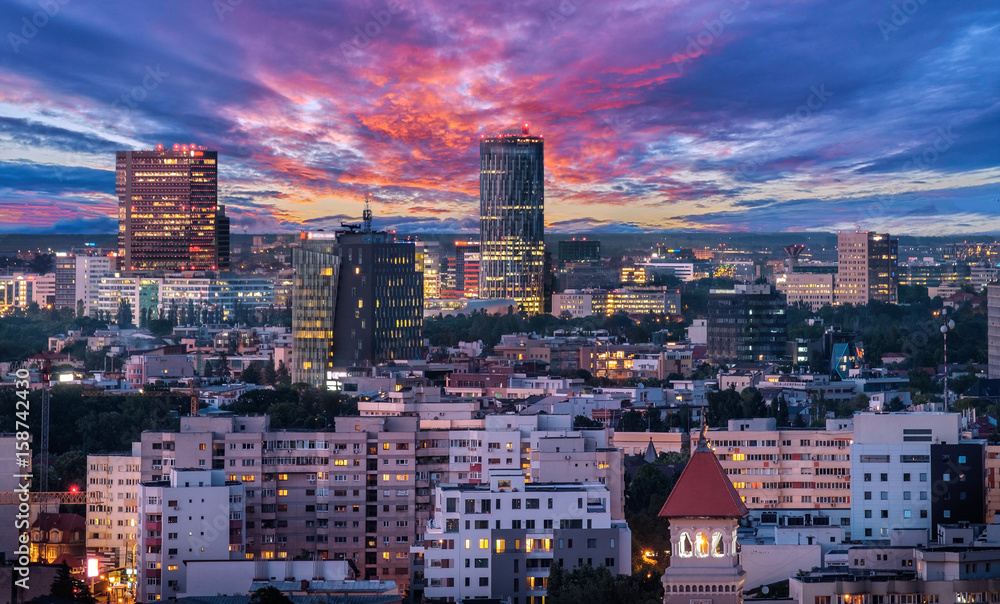 Aerial view of the business district in Bucharest, Romania at sunset.