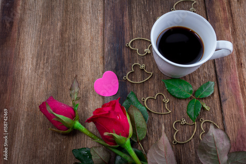 red roses on wooden Board