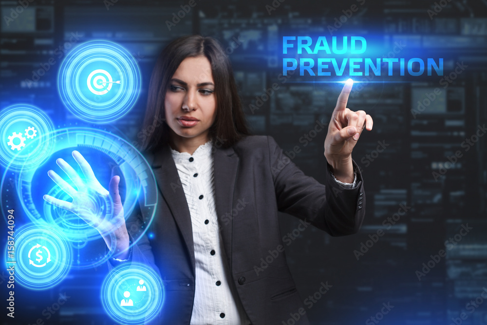The concept of business, technology, the Internet and the network. A young entrepreneur working on a virtual screen of the future and sees the inscription: Fraud prevention The concept of business, technology, the Internet and the network. A young entrepreneur working on a virtual screen of the future and sees the inscription: Fraud prevention
