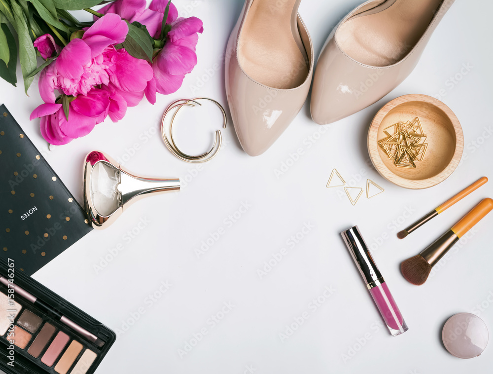 Stylish feminine accessories and pink peonies Stylish feminine accessories and pink peonies
