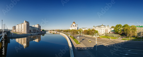Morning panoramic view of Moscow Cathedral of Christ the Savior, Moskva river and embankment from Bolshoi Kamenny bridge in Moscow, Russia.