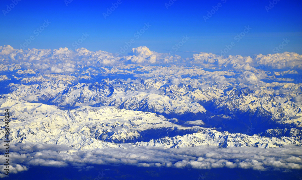 Swiss and French Alps covered in snow - Aerial view