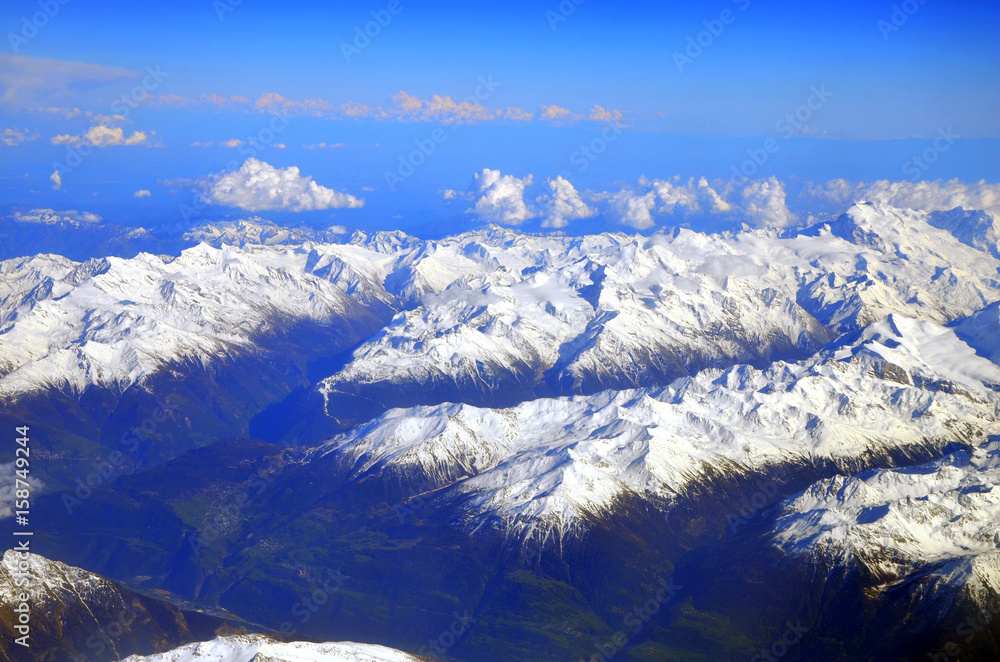 Fototapeta premium Swiss and French Alps covered in snow - Aerial view