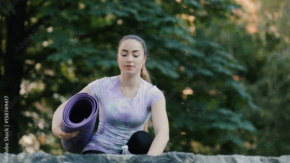 Woman ready to start make yoga exercise Woman ready to start make yoga exercise