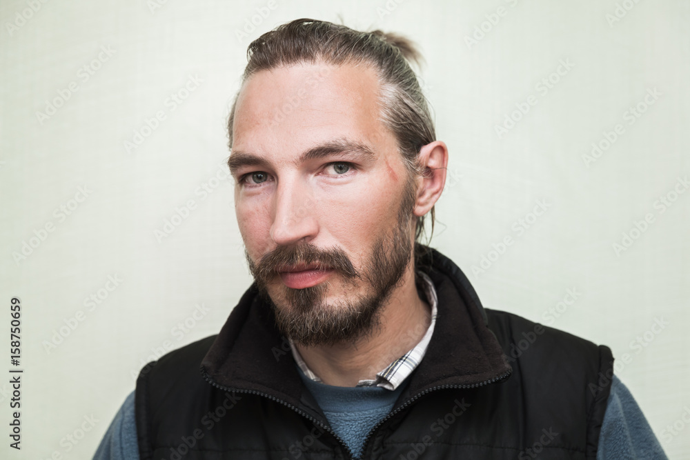 Close-up portrait of young bearded Asian man Close-up portrait of young bearded Asian man