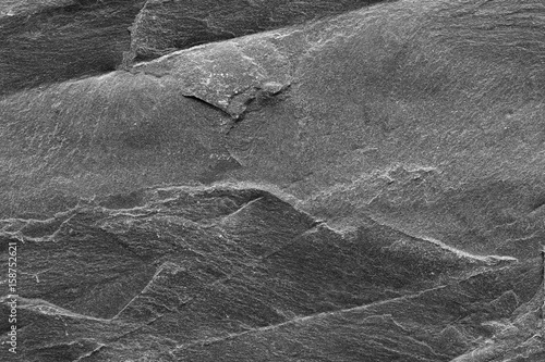 The stone texture in the black and white scene.Roughness surface on the stone.