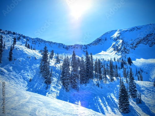 Brighton Ski Snowboard Resort view from the slops of mountains near Salt Lake Valley in Winter Snow photo