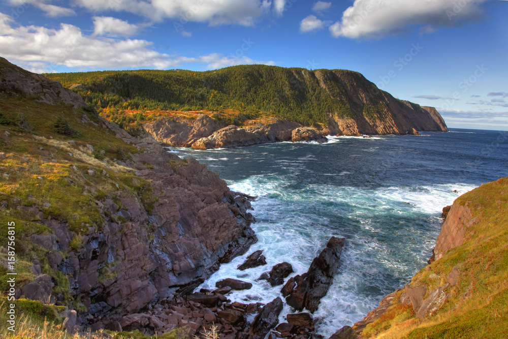 cliffs and ocean waves at cape spear, newfoundland 