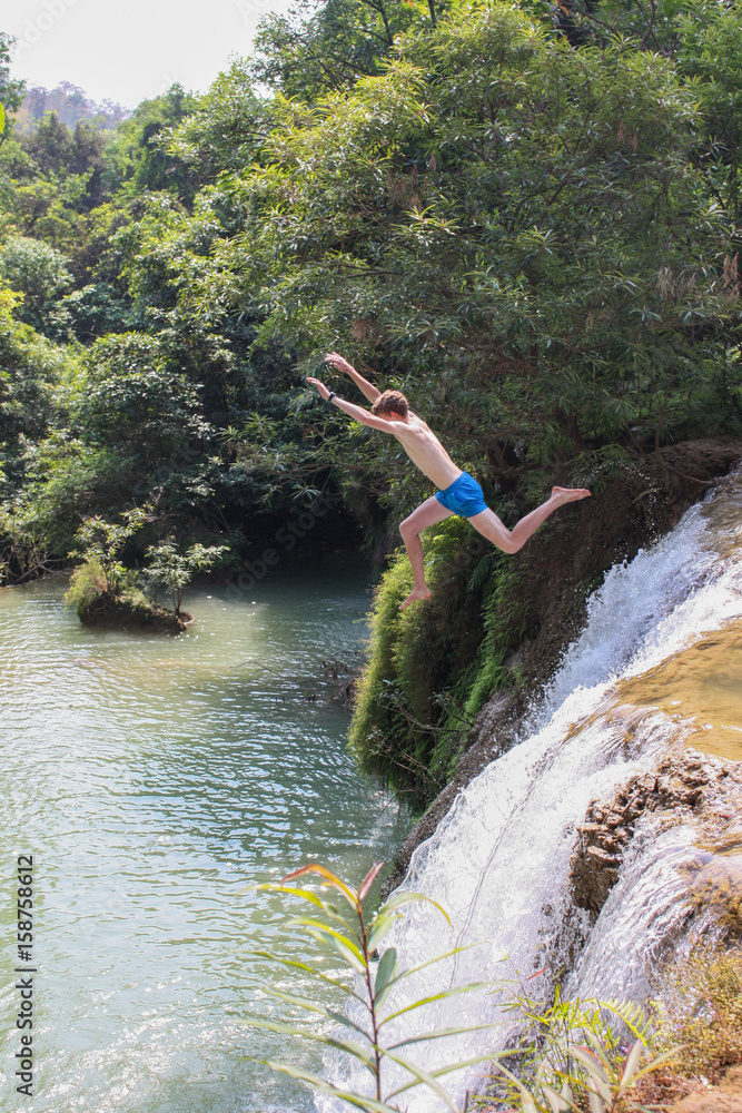 jumping from a 7 m waterfall jumping from a 7 m waterfall