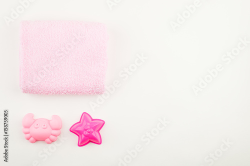 Set for bath or swimming for girl baby. On white background.Top view. Flat lay, pink, copy space © misskaterina